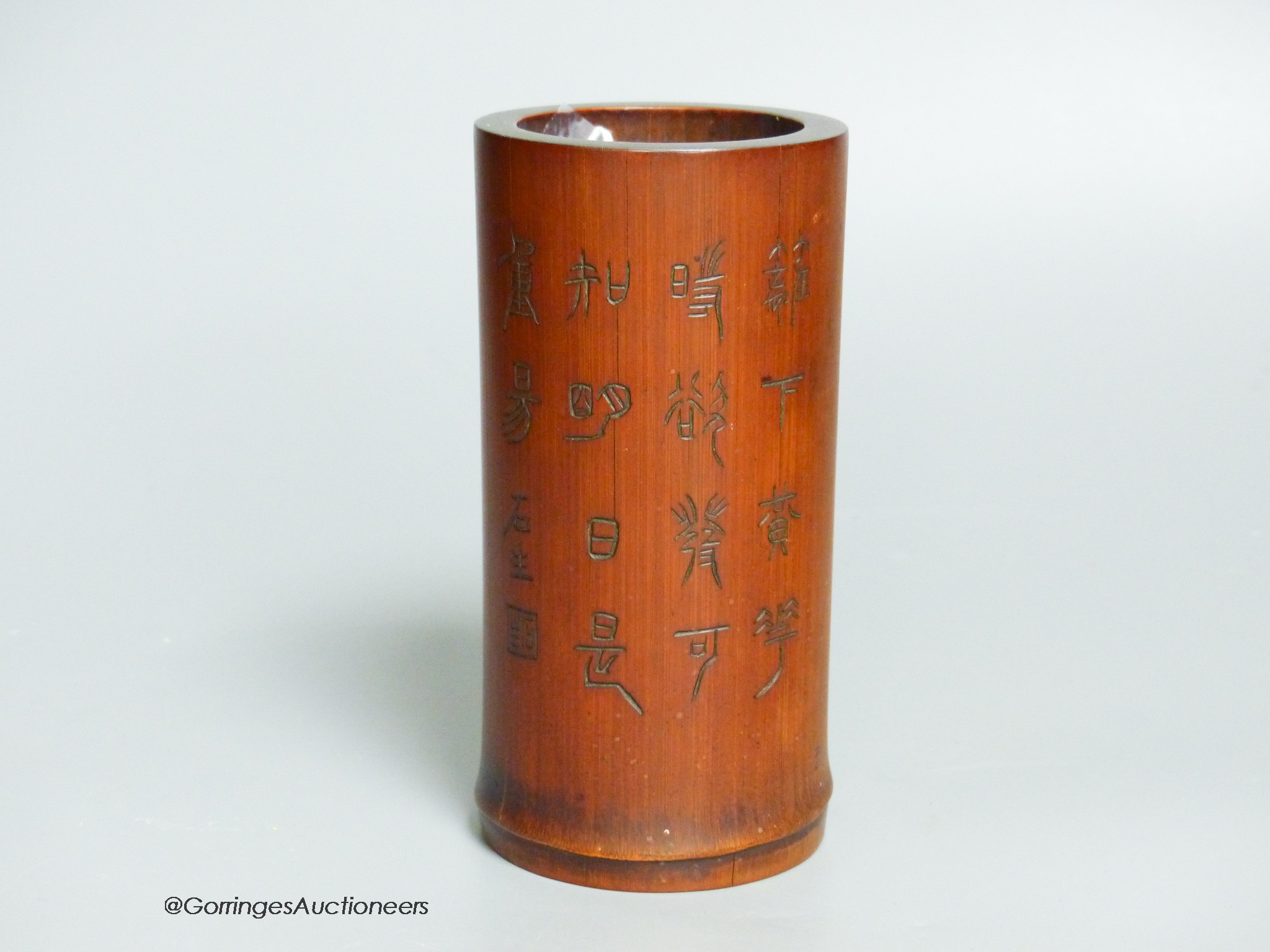 A Chinese bamboo brushpot, 14.5cm tall